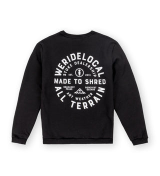 Back view of We Ride Local All Terrain Black Crewneck – large white circular graphic on back, relaxed unisex fit